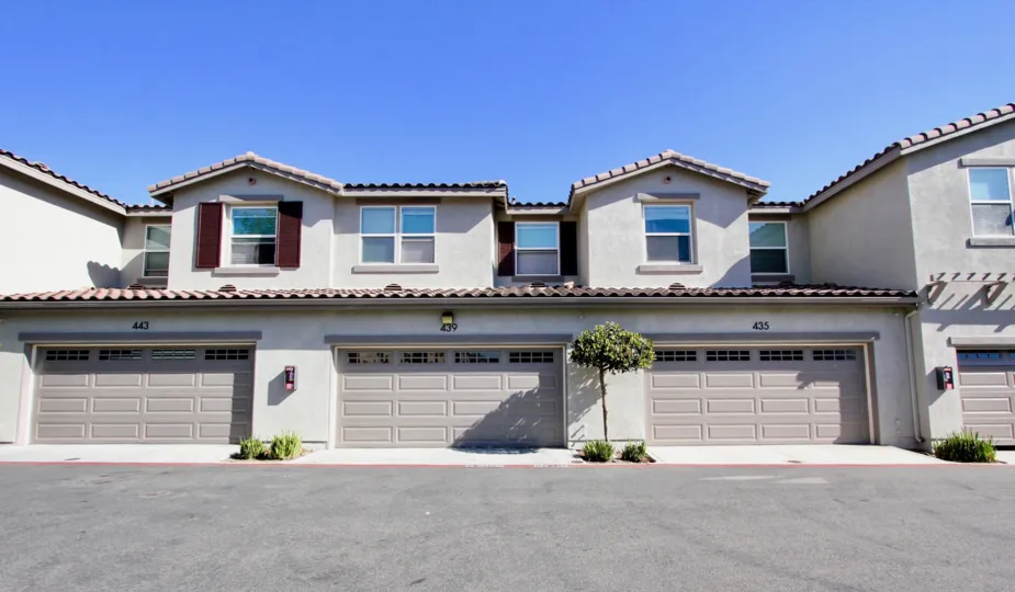 A sunny day in the area of Santa Fe Walk, garage, parking lot, condo, tree