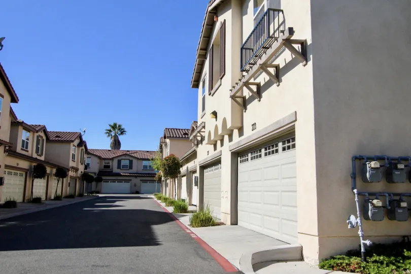 A well maintained and clean driveway sits between to condo buildings at Santa Fe Walk.
