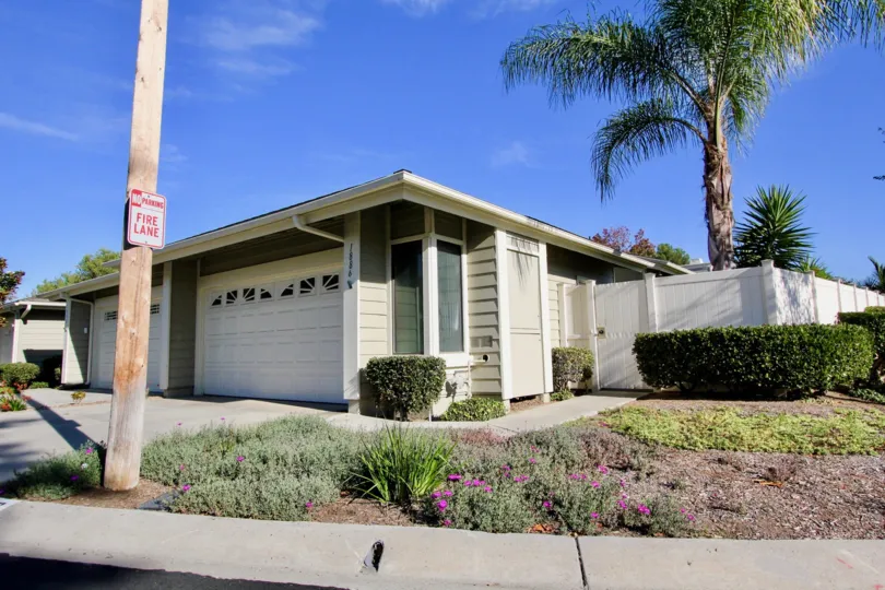 VERY BEAUTIFUL HOUSE. IN FRONT OF IT THERE IS A LAWN. GREENERY IS EVERY WHERE.