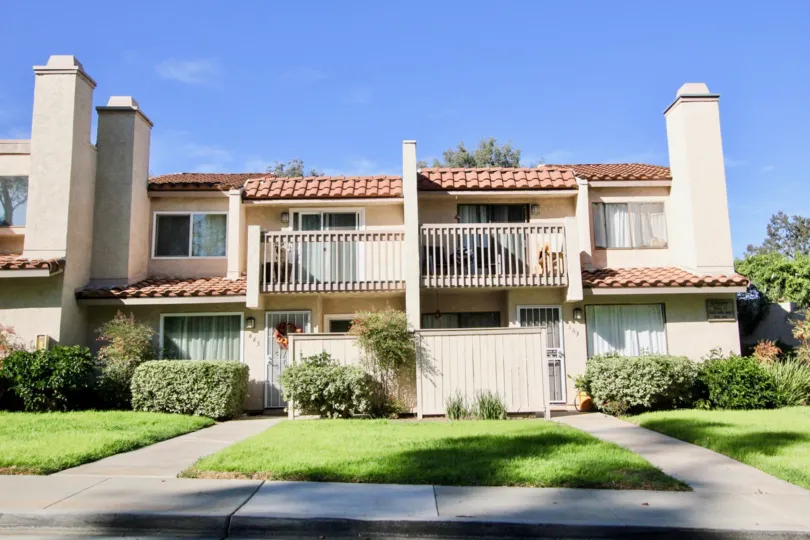 A sunny day in the area of Vista De Vista, condo, grass, chimney, porch, gated doors