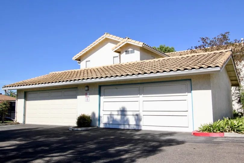 A white house on a sunny day in Vista Palomar in Vista.