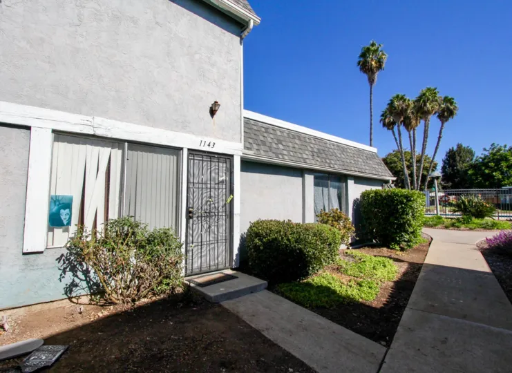 Front view of house in sunny VIsta Park Villas in Vista, California