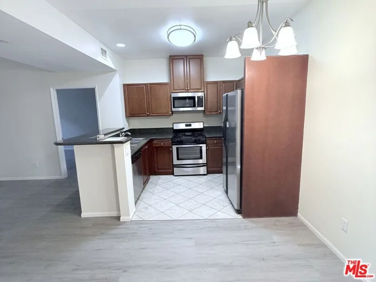 13941 Sherman Way #204 photo 2