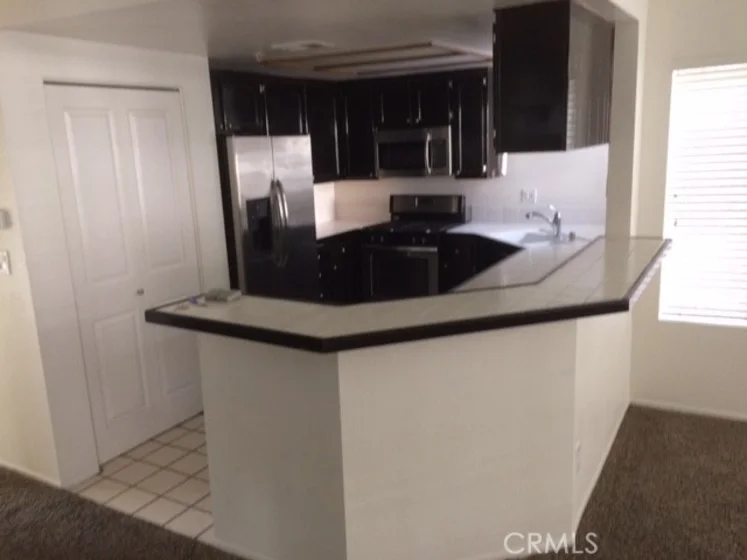 4591 Warner Avenue #203 photo 14
