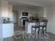 5050 Canyon Crest Drive thumbnail 4