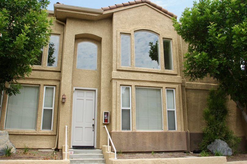 Altia corona California most front part of building covered with lengthy doors and windows with cute plain clear glass