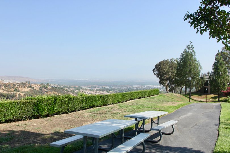 The tables also located at outside and it looks like a park relaxation tables for people to take rest