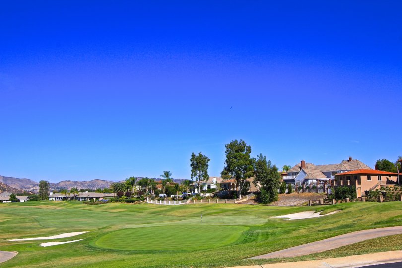 Beautiful gold coarse under brilliant blue skies at Fairway Estates at Bear Creek