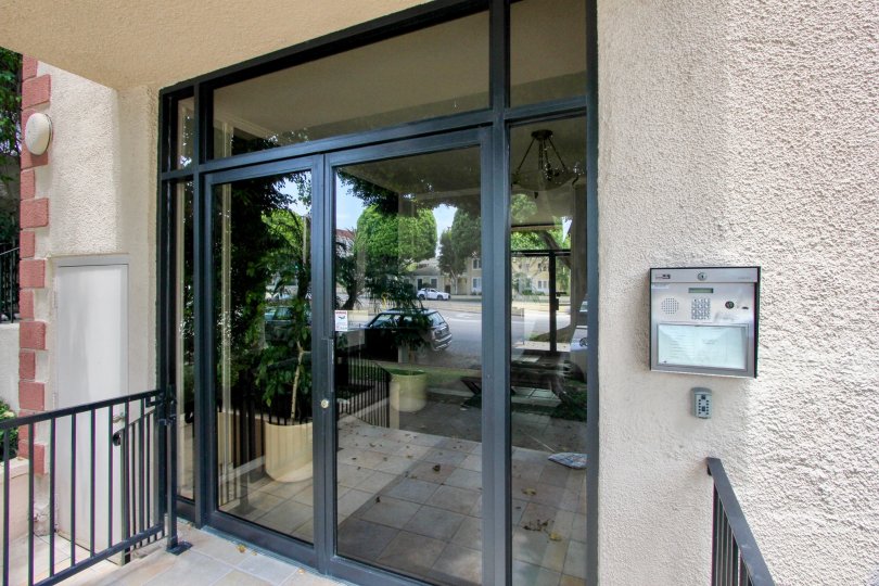 A residential entrance with code at the entrance of The Cambridge community.
