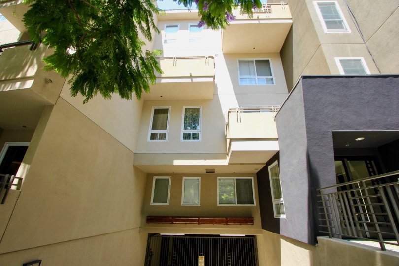 Parking Garage entrance at Wellesley Manor with personal porches and entrance to building.