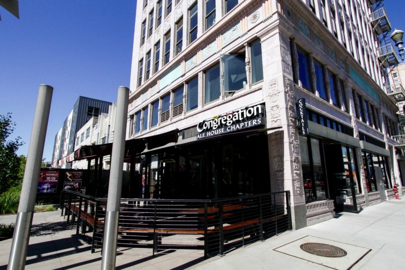 A restaurants occupies the corner of the first floor of Insurance Exchange Lofts building