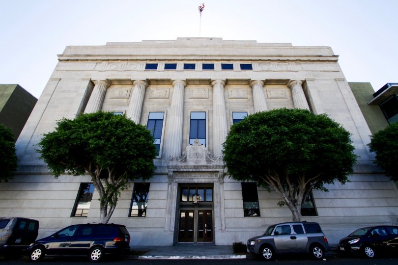 An American flag stands atop the Masonic temple adjacent to Temple Lofts