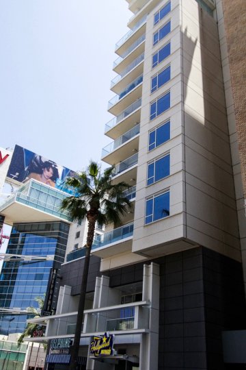 At the corner of the W Hollywood Residences building glass balconies ascend to the top
