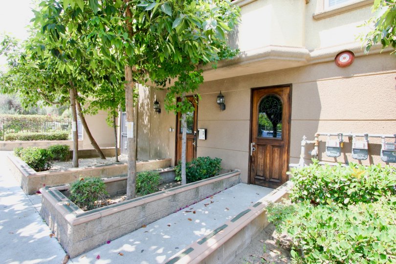 A sunny day in the Arena Cove Villas with an entrance of a house.