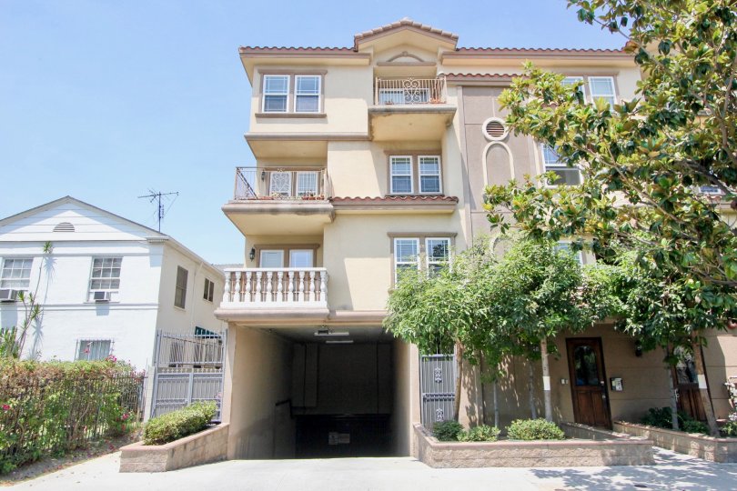 View of Arena Cove Villas on a clear day in Koreatown, CA