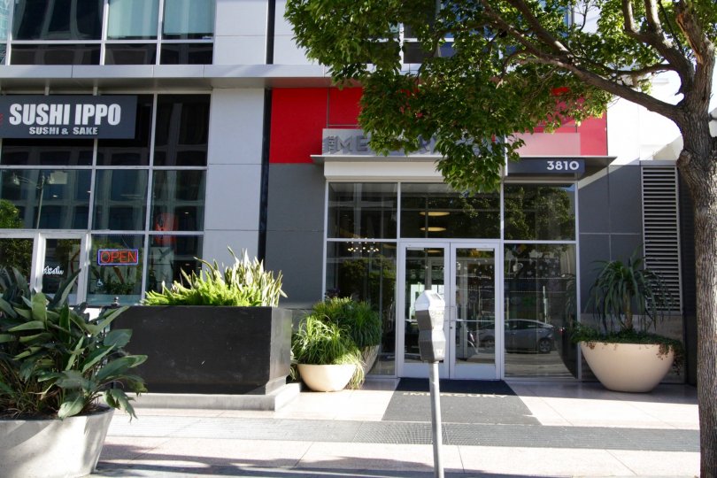 Bright red and dark grey contrast the entry area of The Mercury