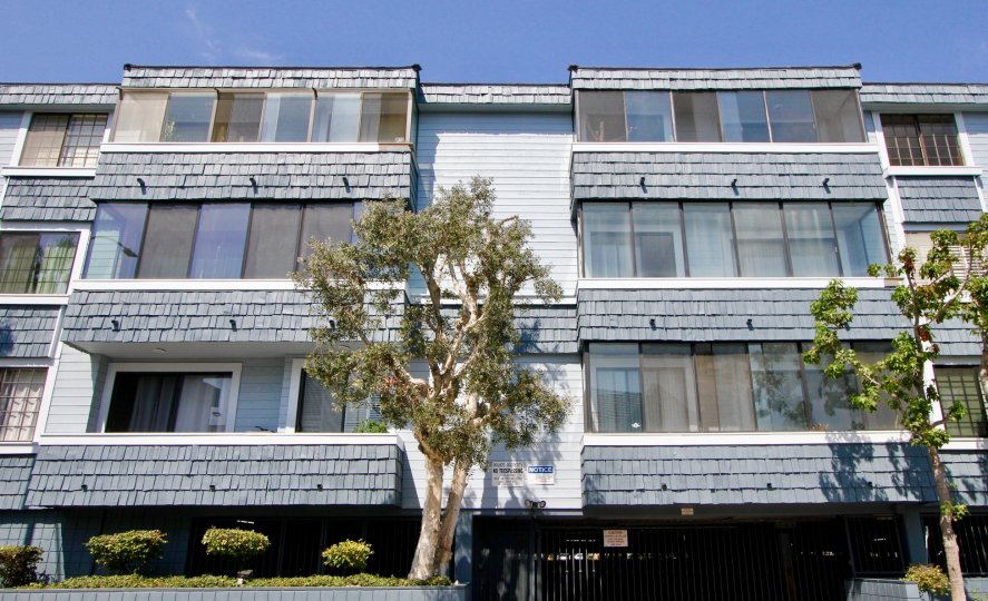 Building of 3 floors surrounded by trees in Via Marina Tahiti community