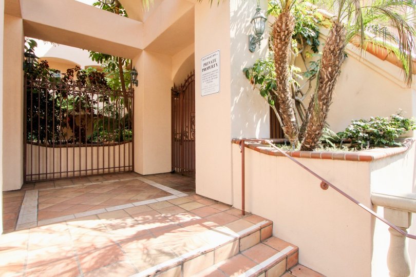 Idaho Villas gate is closed and inside flowers are there and arranged