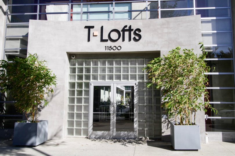 The glass entrance of T Lofts of West LA