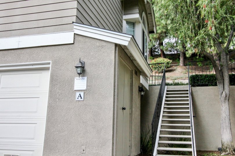 THE A. VILLAS IN THE CANYON VILLAS WITH THE STEPS, PLANTS, TREES