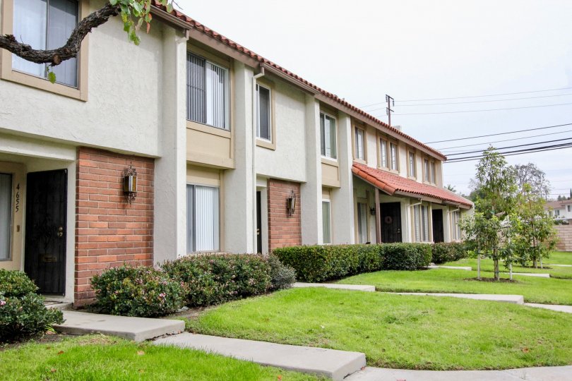Attractive view of lawn near villas in Casitas California of Buena Park