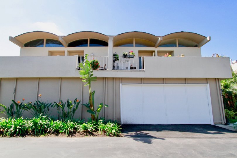 The home in the Newport Rivera is very huge and beautiful look with lots of trees and plants and also with clean street and sheds,