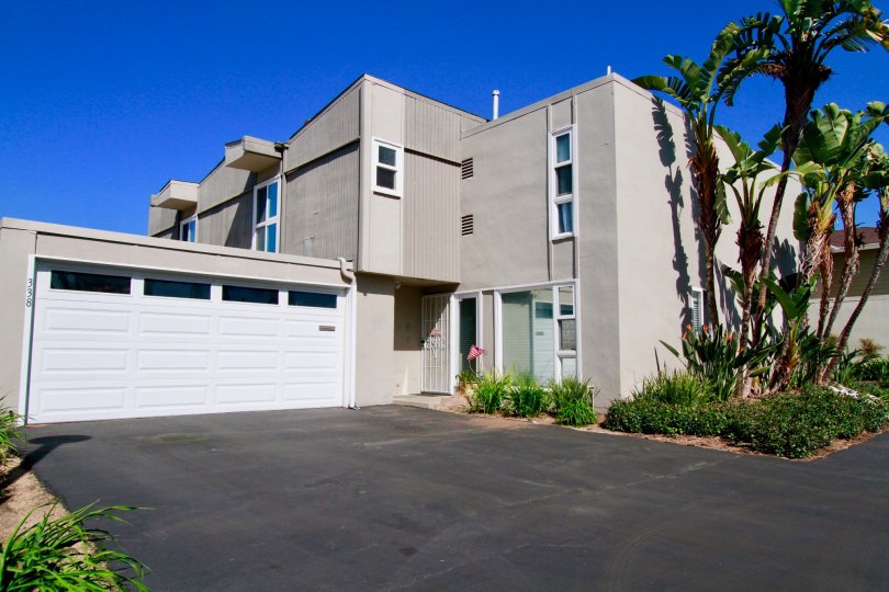 A home in the Newport Riviera is the very beautiful with residential area and in that home having shed, trees, plant.
