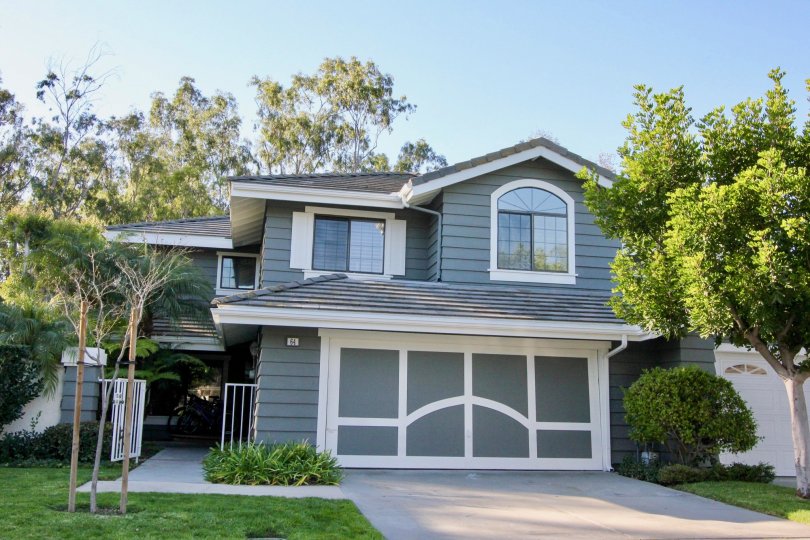 White trim decorates a gray garage door at the Ridge Garden Homes community.
