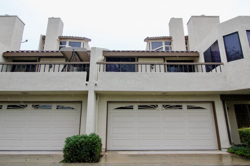 These Mediterranean style homes are located in a gated community of 214 low rise condos right on the mile long lake that is stocked annually with fish