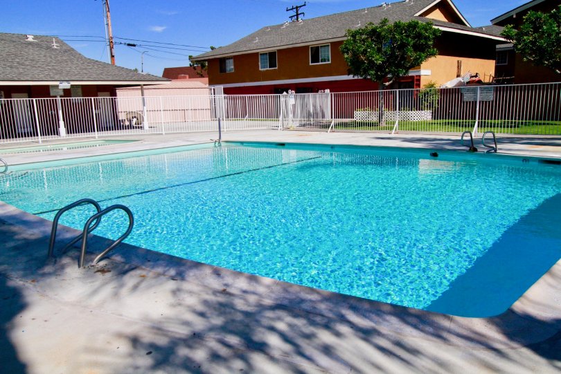 Gated swimming pool with kids pool in Fairlane Gardens community, Santa Ana, CA.