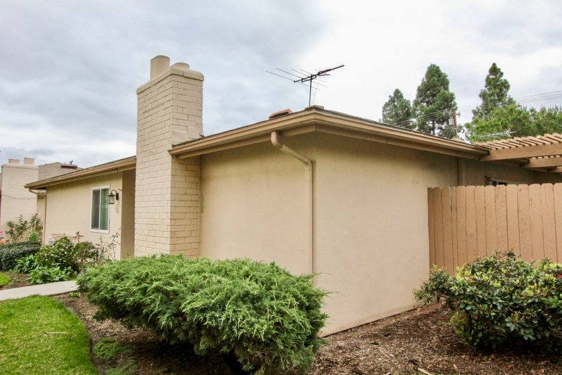 A wire television antennae sits on top of a house in Tustin Park Villas