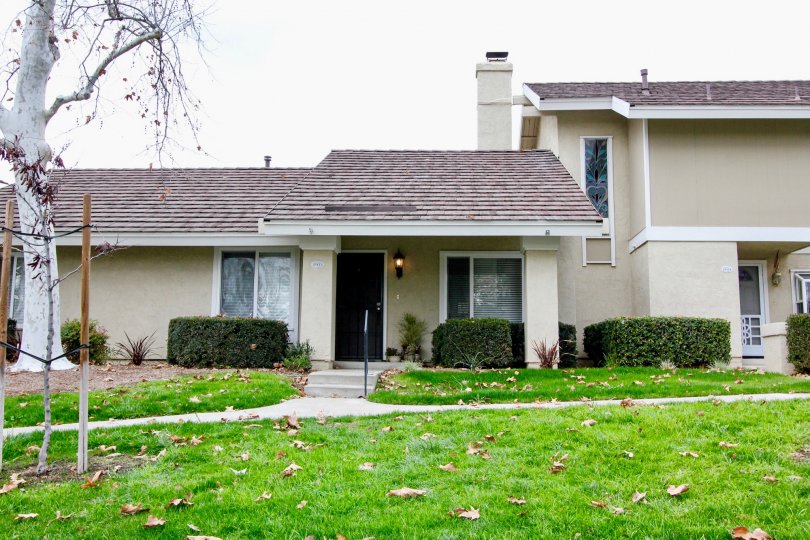 A beautiful day in the Rancho Dominguez Townhomes with a beautiful apartment and lawn.