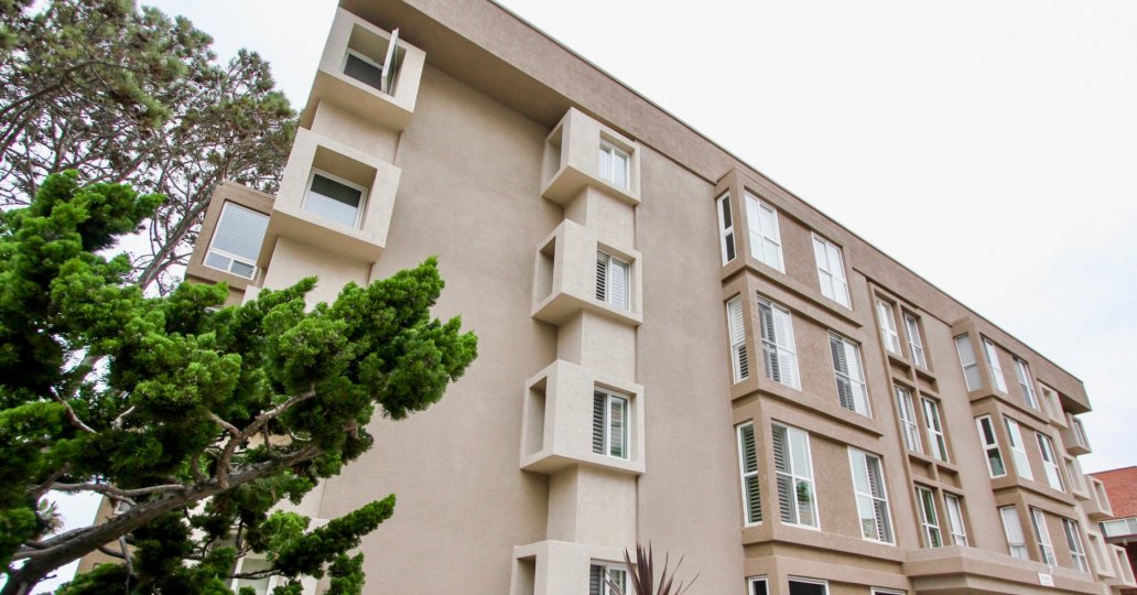 Brown building with lots of windows at Shorepoint in La Jolla CA