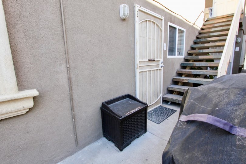 Closer view of staircase and front yard of an apartment i San Fernando Bay Villas, Mission Beach, California