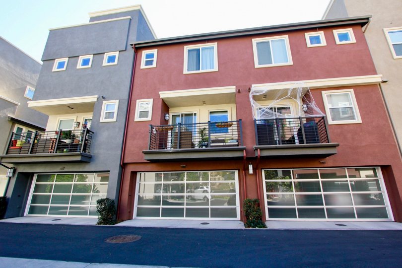 Pink color walls with glass windows and balcony in Skyloft at Origen.
