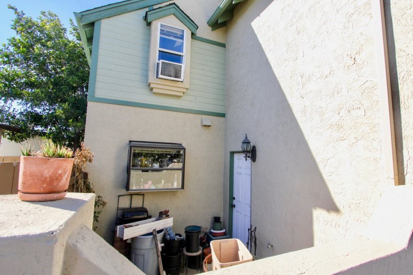 A crowded backyard of a housing in the Norman House III community.