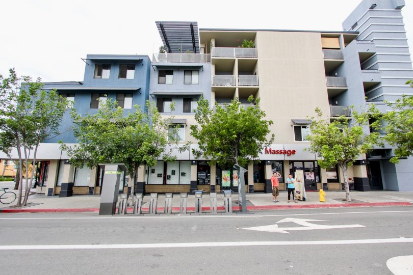 A street view of some small apartment buildings in the Palisade Gardens area of North Park, California