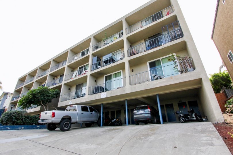 A three story residential building with built in parking in Sans Soucia at Ocean Beach CA