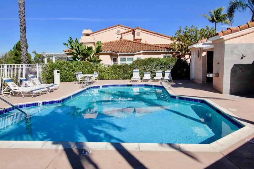A sunny day showing a sparkling pool in the Masters Hill community in Rancho Bernardo, California.