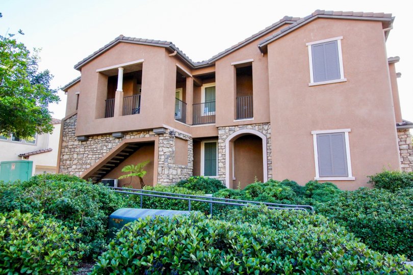 A two story property with various buses and stone detail in Savannah Terrace