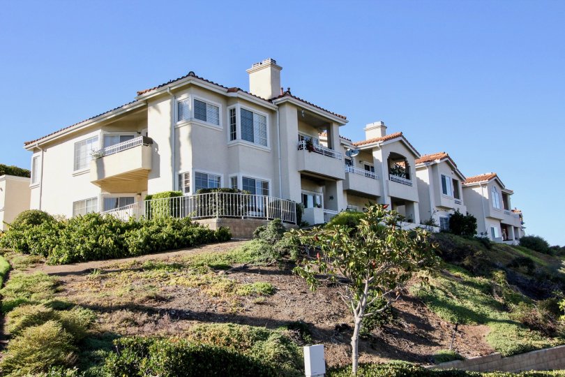 A hilly view of a two-storey townhouse in the Panorama community.